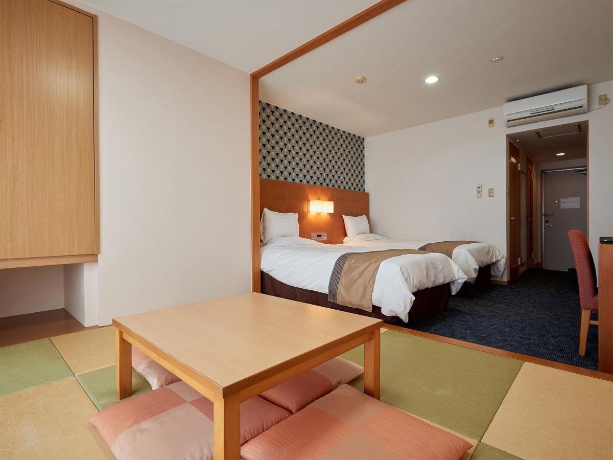 Hotel Murasakimura Йомитан Экстерьер фото