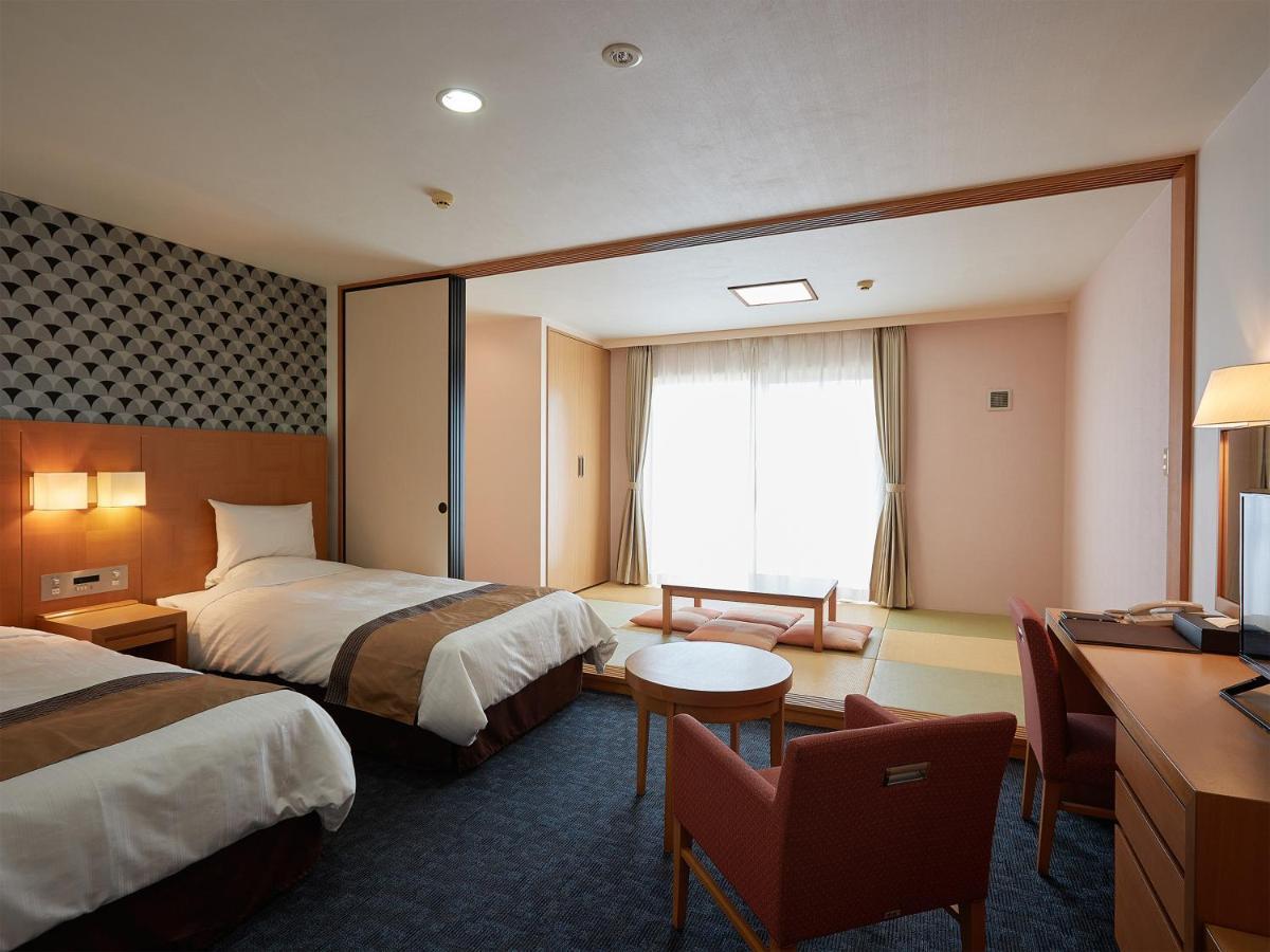 Hotel Murasakimura Йомитан Экстерьер фото